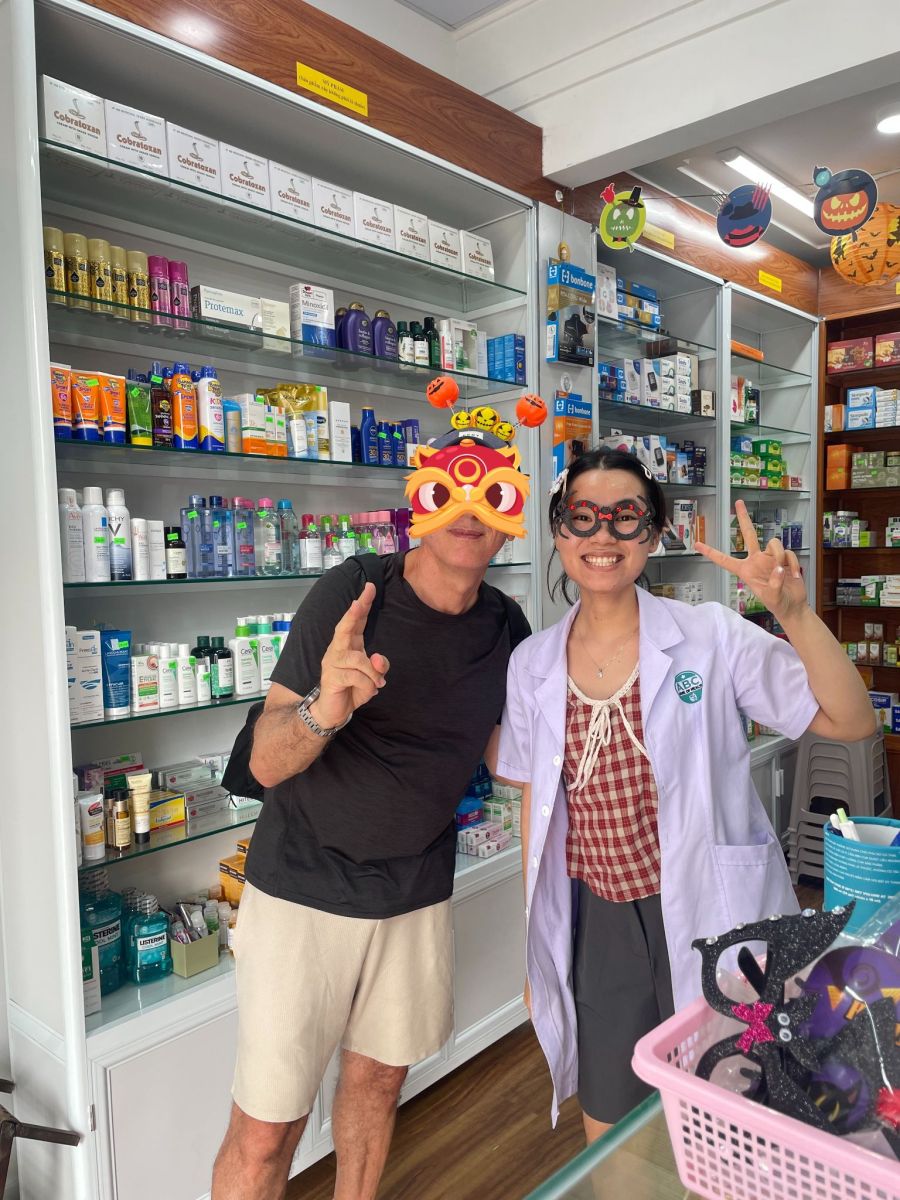 Pharmacist assisting a customer at ABC Pharmacy in Da Nang