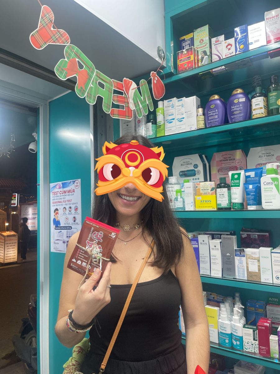 A customer at Thanh An Pharmacy in Hue, an English-speaking pharmacy offering medicine delivery to hotels