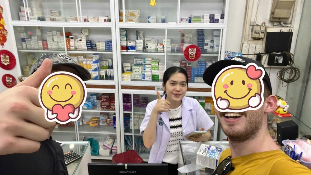 Smiling clients inside the modern and clean environment of MIA Pharmacy Hue