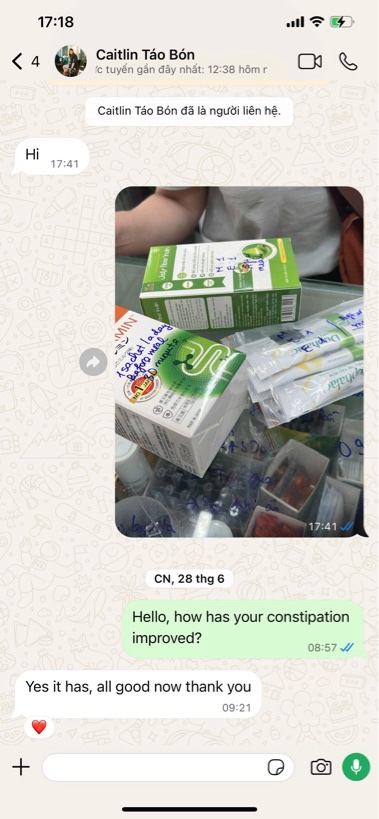 ABC Pharmacy pharmacist providing constipation care advice to a traveler in Da Nang, Vietnam