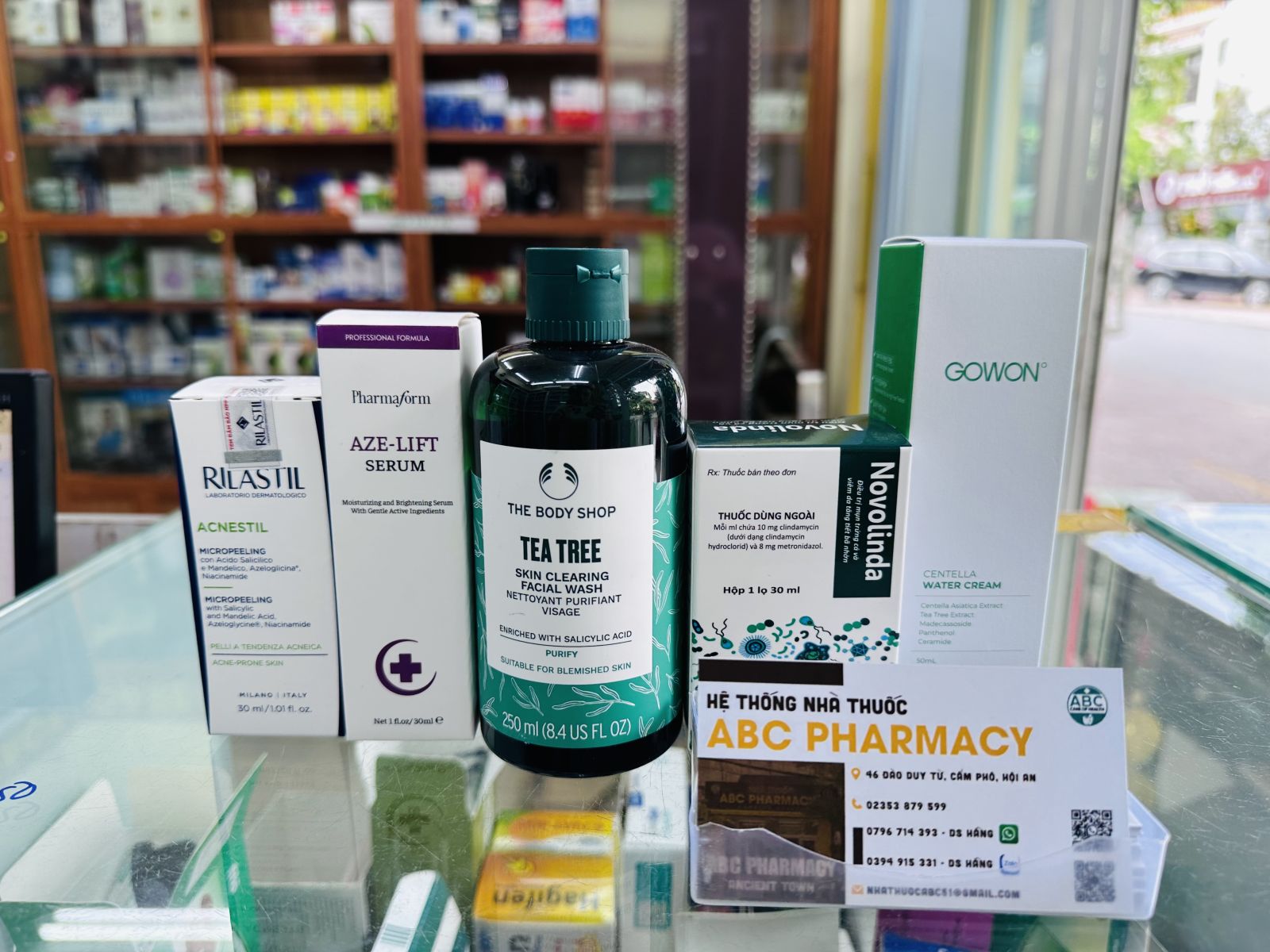 ABC Pharmacy Da Nang acne support products for oily sensitive skin including Tea Tree facial wash, Rilastil Micropeeling, Azelift serum, Novolinda, and Gowon Centella Water Cream