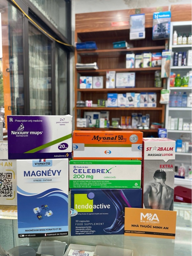 Shoulder pain support products displayed at ABC Pharmacy Hoi An, including celecoxib, esomeprazole, eperisone, supplements and massage lotion